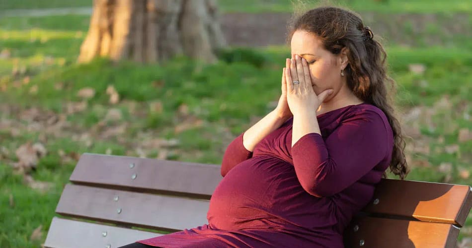 Schwangere Frau in Not