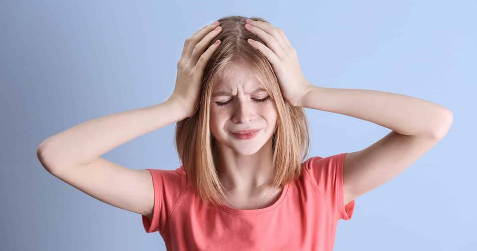 Kind mit Kopfschmerzen - Migräne